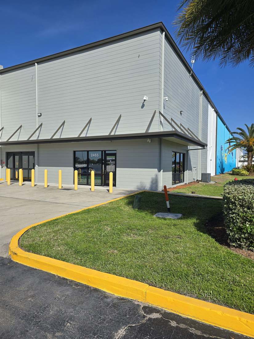Commercial building exterior repaint, entrance view