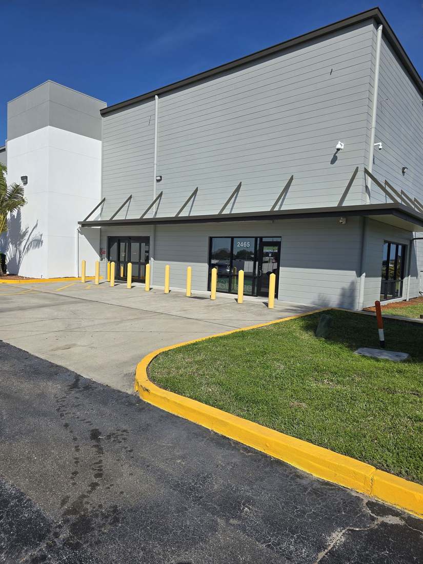 Commercial building exterior repaint, side view