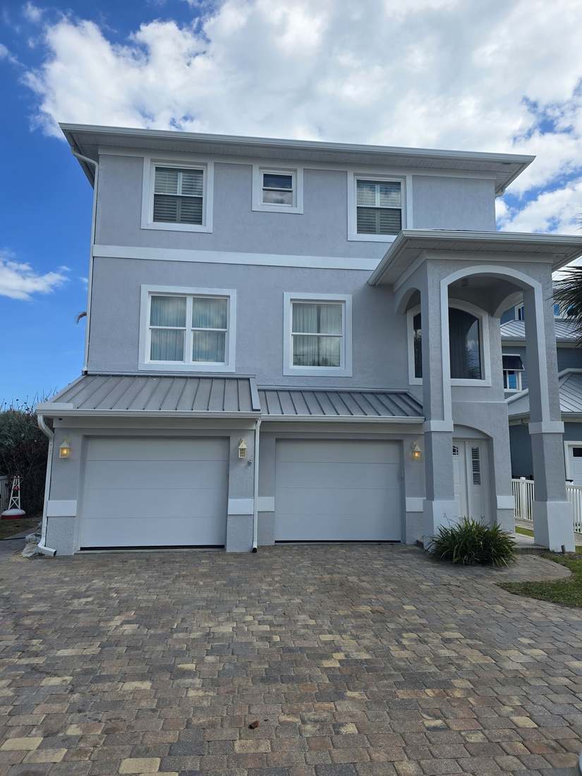 Repainted home stucco and trim detail